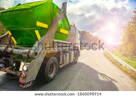truck on the road, Urban recycling waste and garbage services  , Royalty-Free Stock Photo #1860098914
