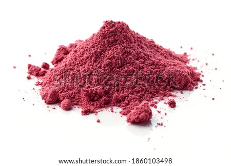 heap of dried beet root powder macro isolated on white background, selective focus Royalty-Free Stock Photo #1860103498