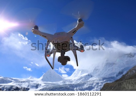 Flying drone taking picture of glacier in Tibet,China