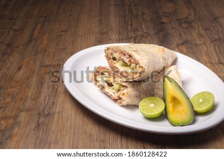 Traditional mexican gourmet food. Mexican food on table. Mexican burrito concept.