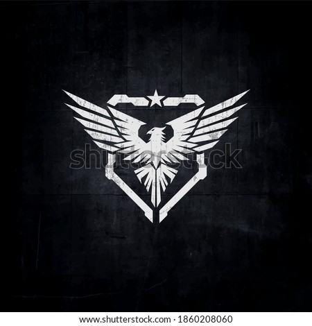 eagle tactical logo, bird military logo concept Royalty-Free Stock Photo #1860208060