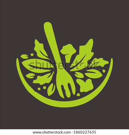 green spoon and vegetable logo