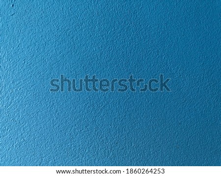 Cement floor in the bedroom Or the floor flap of a cement house that is painted over with blue / Home paint with interior paint in industry