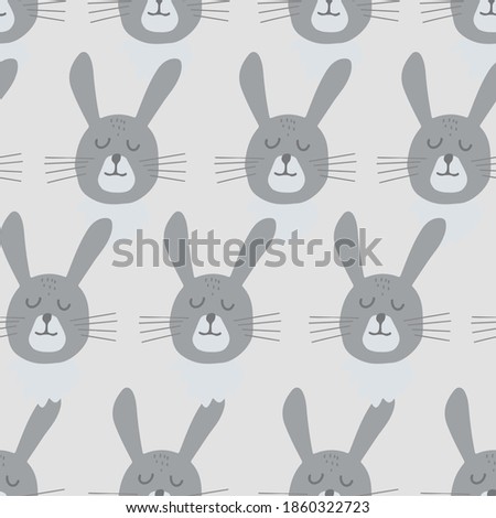 Seamless pattern with cute rabbit head. Decorative wallpaper for the nursery in the Scandinavian style. Vector. Suitable for children's clothing, interior design, packaging, printing.