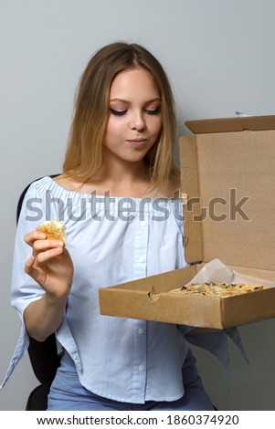 happy teenage girl with box of pizza