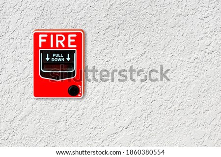 fire break glass on the concrete wall background