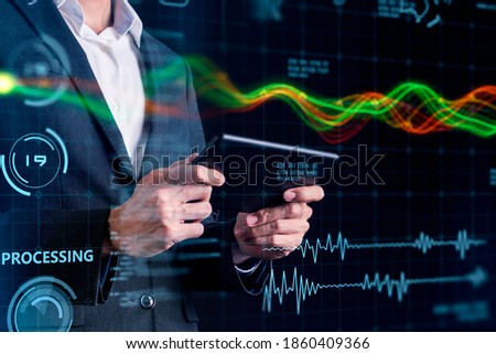 Finance business investment strategy competition, business man in suit with tablet mobile, data analytic artificial intelligence technology futuristic graph chart stock exchange data screen 