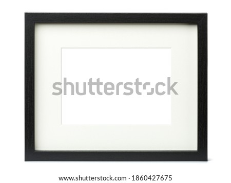 Textured black picture frame with matte, isolated on white background, blank image area masked with clipping path