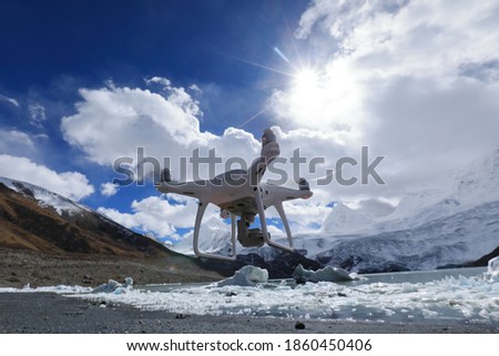 Flying drone taking picture of glacier lagoon  in Tibet,China