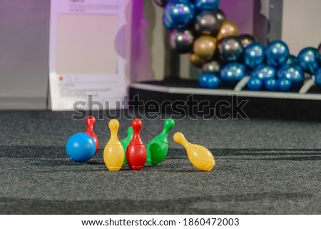 Top view of colorful skittles standing on playground floor