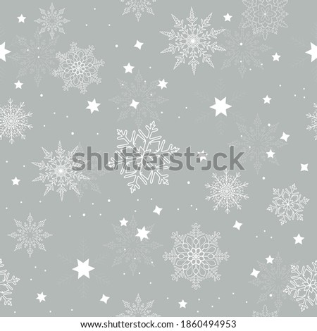 Cute snowflakes on gray background. Seamless pattern with winter motif. Vector illustration.