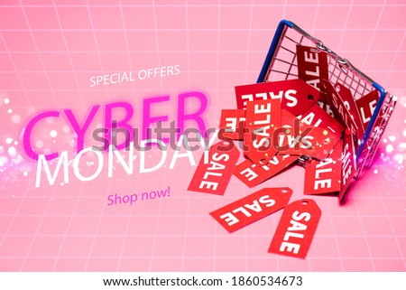 sale tags near shopping basket and special offers, cyber monday, shop now lettering on pink, black friday concept