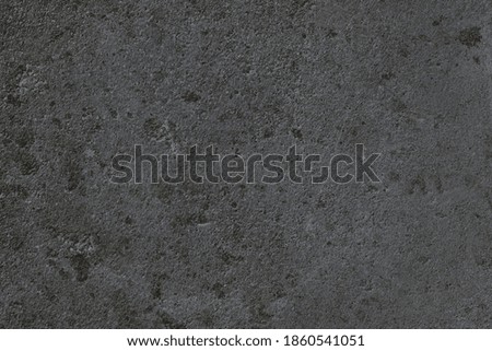 Black color concrete wall texture for background and design.