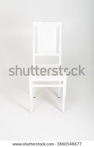 White wooden chair on a white background.