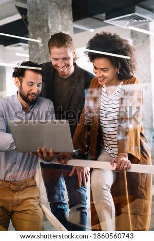 Successful company with happy workers. Business, meeting, office concept Royalty-Free Stock Photo #1860560743