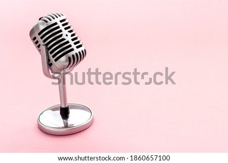 Vintage retro style silver microphone, close up, copy space
