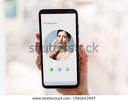 Smartphone with beautician contact on display