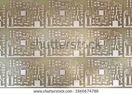 Photography of Printed Circuit Board fabrication background. Designing diy electronic equipment. Modern Technology Texture.