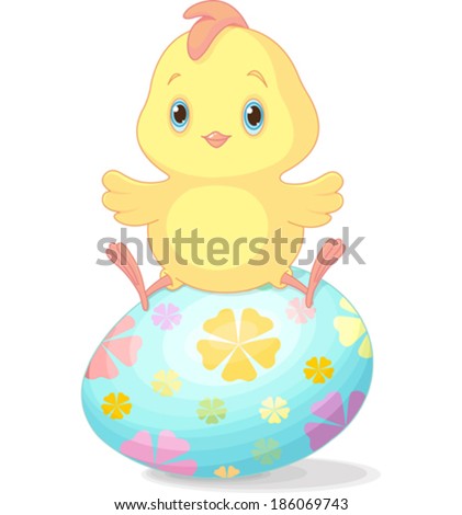 Cute chick sitting on Easter egg 