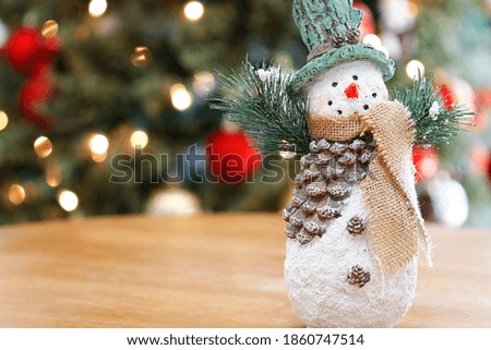 Beautiful background with balls and merry christmas lights with snowman