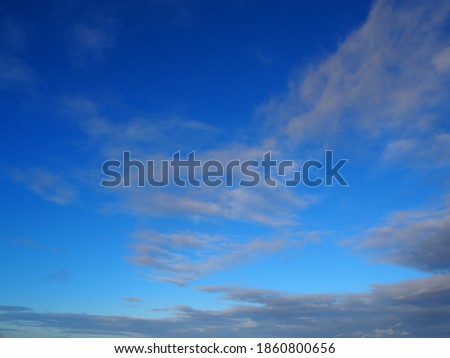 a beautiful blue sky with clouds background and texture 