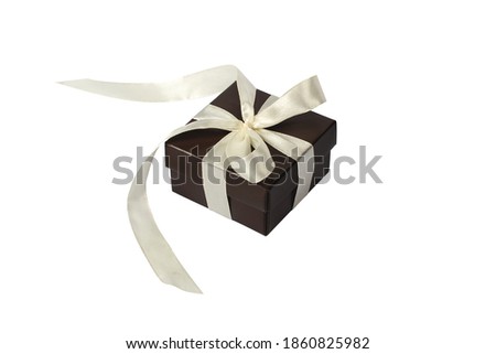 Gift box with a bow isolated on white background. Festive gift wrapping