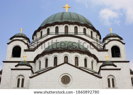 Close-up of the upper part of the facade of the Serbian Orthodox Church of Saint Sava in Belgrade, Serbia Royalty-Free Stock Photo #1860892780