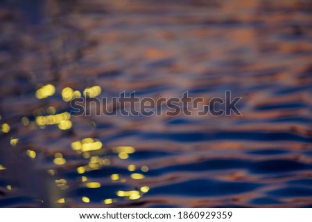 Awe beautiful vibrant cyan shallow moonlight night path of round highlights spot particles on wet misty backwater area. Close-up view with space for text on fresh blur spa pool. Spring travel scene

