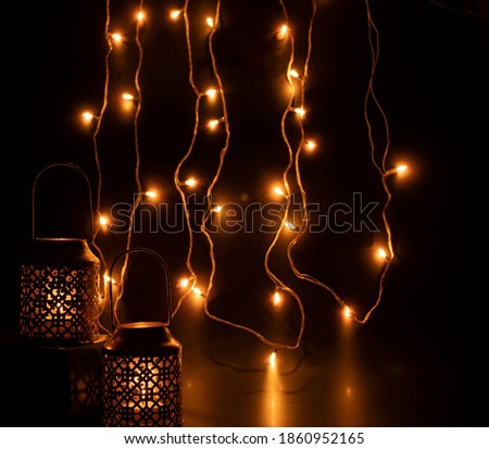 tea light candle holder placed against LEd series light 
