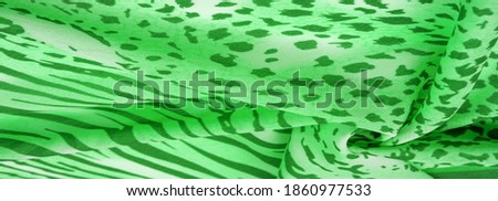 silk fabric with green-white stripes, zebra skin in African style. For the designer, the sketch of the layout, the entourage of the decorator. Background texture collection
