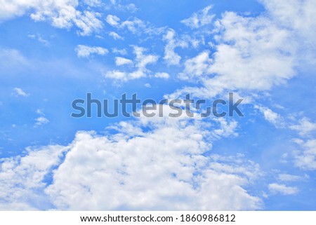 blue sky background with  clouds. Clouds float on the blue sky.