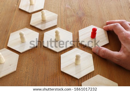 business concept image of people figures over wooden table, human resources and management concept