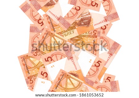 5 Belorussian rubles bills flying down isolated on white. Many banknotes falling with white copy space on left and right side