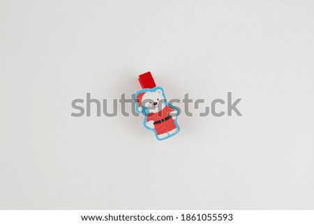 santa claus on clothespin on a white background