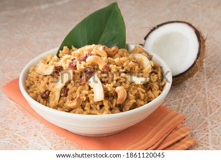 South Indian Sweet pongal made from rice, milk, jaggery and dry fruits.coconut sweet pongal Royalty-Free Stock Photo #1861120045