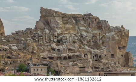 Urgup Town aerial view from Temenni Hill in Cappadocia Region of Turkey timelapse. Old houses and buildings in rocks at early morning Royalty-Free Stock Photo #1861132612