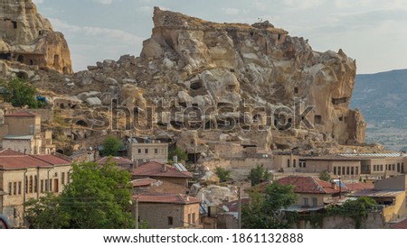 Urgup Town aerial view from Temenni Hill in Cappadocia Region of Turkey timelapse. Old houses and buildings in rocks at early morning Royalty-Free Stock Photo #1861132888