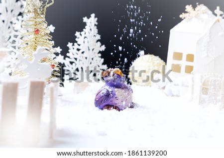 Funny owl on winter snowy background with trees. Christmas or Winter concept.