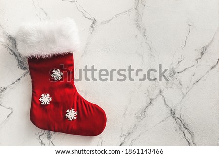 Beautiful Christmas sock on white background