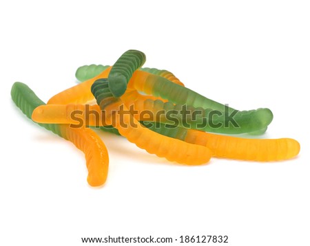 Jelly worms or snakes candies on a white background   