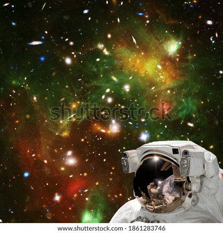 Astronaut against deep space. The elements of this image furnished by NASA.

