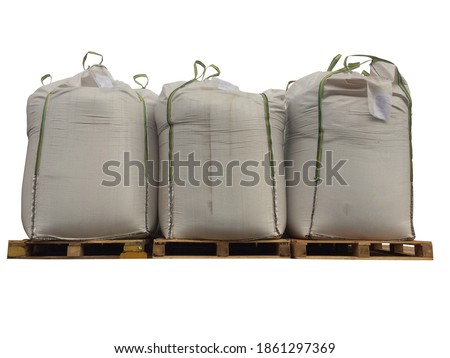 Stock Chemical fertilizer Urea   jumbo-bag in warehouse waiting for shipment.Put on wooden pallets on the White Background
