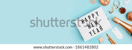 Happy New Year Text Light Box. Panorama Banner. Goodbye 2020 Concept Wide Angle Image On Blue Background. Abstract Celebration Concept With Copy Space For Message.