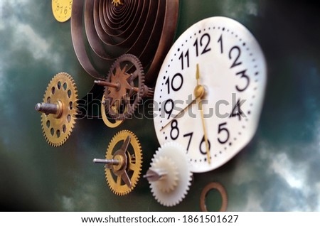 Abstract composition of old fashioned clocks and mechanisms
