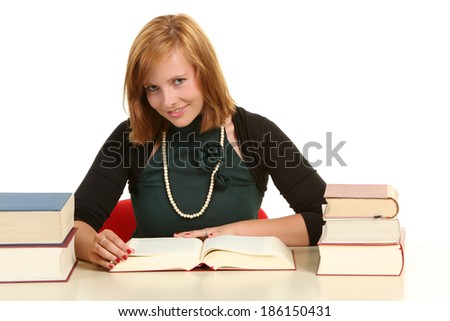 Young girl studying for exams.