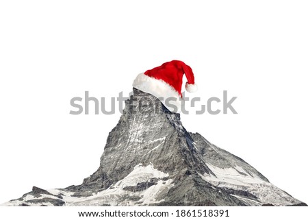 The Matterhorn ( Italian: Cervino) with Santa Claus hat. It is a mountain of the Alps located in the border between Switzerland and Italy. Isolated on white background