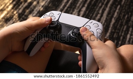 Boy with next gen controller in your hands