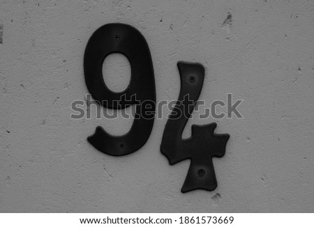 Neighbourhood house number ninety-four in black