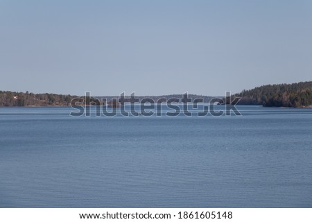 Panoramic view of the lake Malaren and forest on background, Sweden.