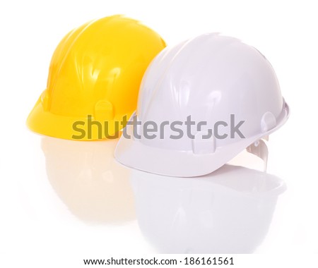 Yellow and white safety helmet on white background